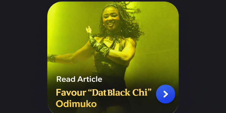 Favour “Dat Black Chi” Odimuko performing a high-energy dance routine on stage, captured mid-movement under dramatic concert lighting.